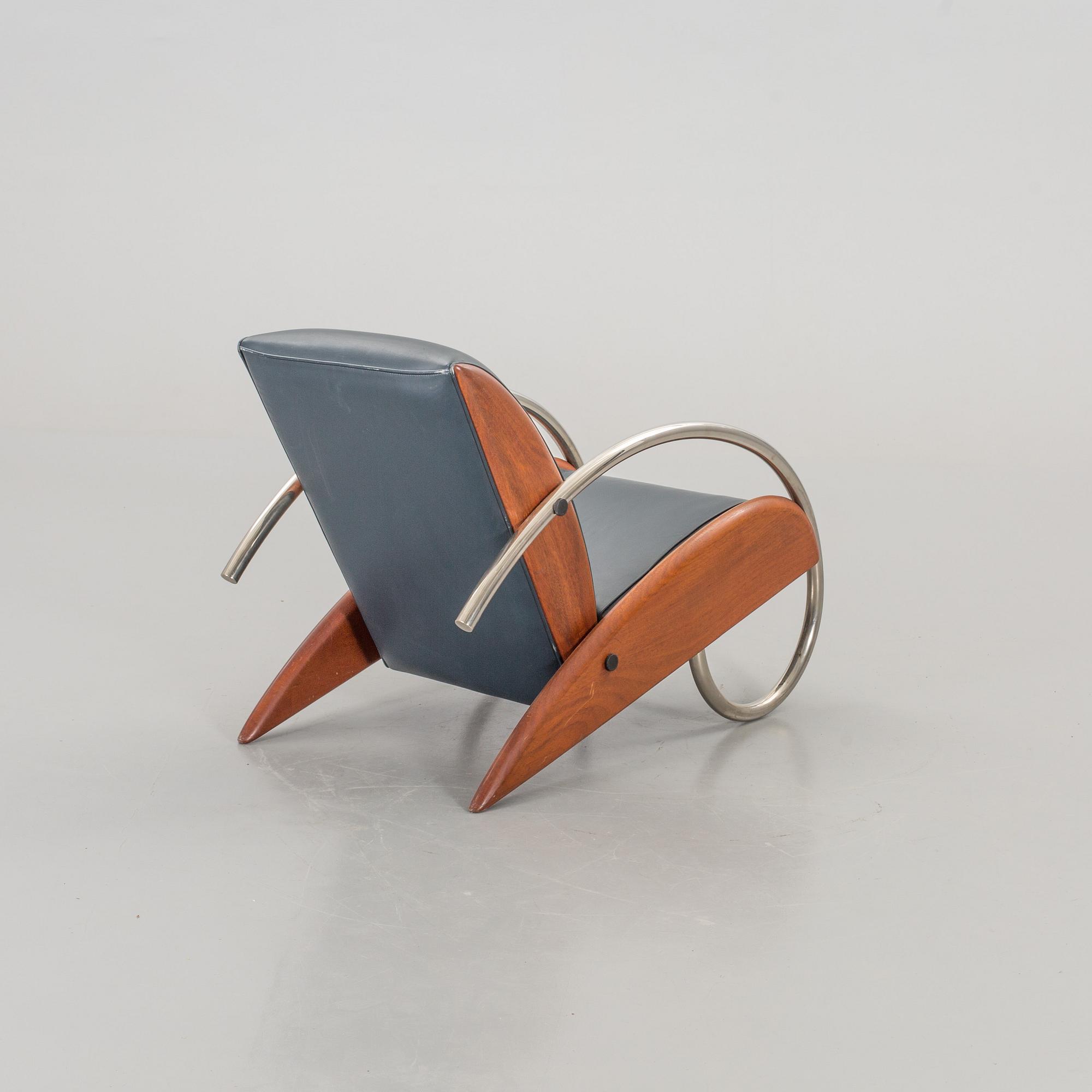 AN "STEAMLINE" ARMCHAIR BY KLAUS WETTERGREN, DENMARK, 1980'S.