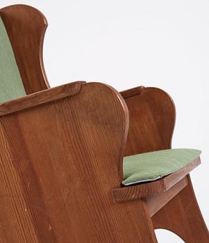 Nordiska Kompaniet, a Swedish Modern stained pine 'Lovö' rocking chair, 1940s.