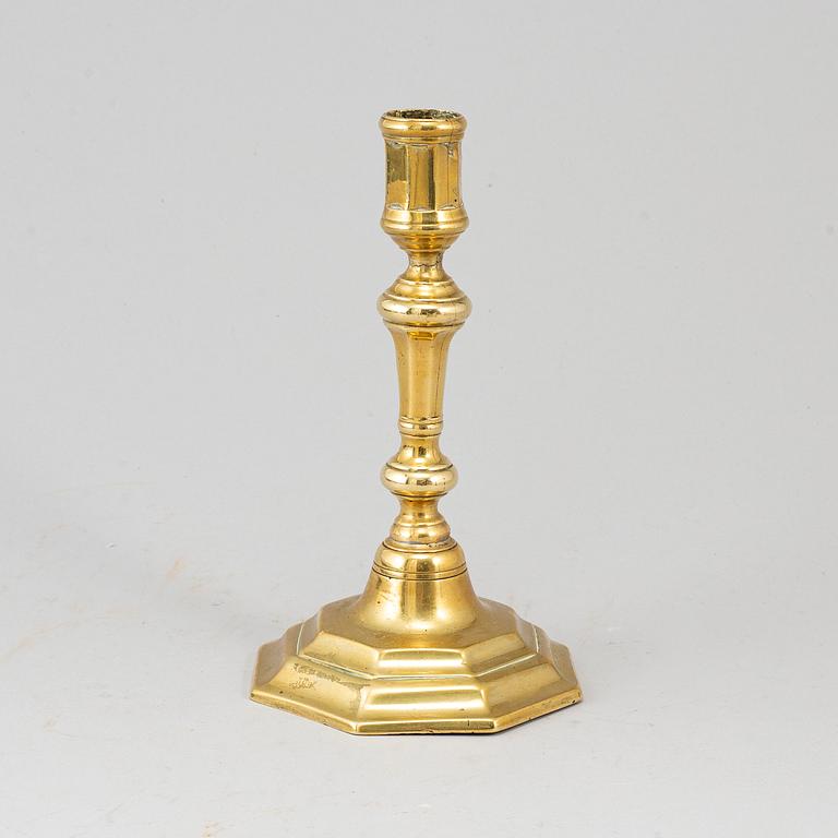 An 18th century bronze candlestick.