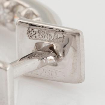 Brilliant cut diamond hoop earrings.