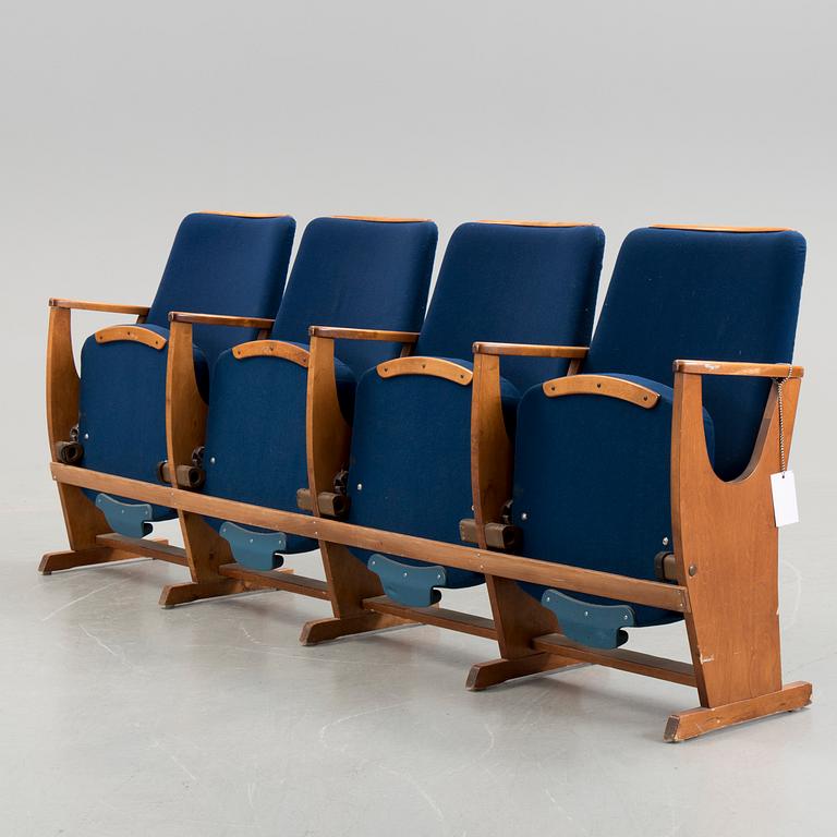 A four seated cinema sofa, mid 20th century.