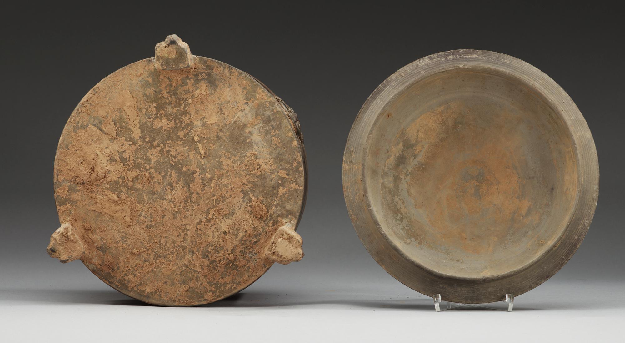 A potted tripod censer, Western Han dynasty (206 BC – 220 AD) .