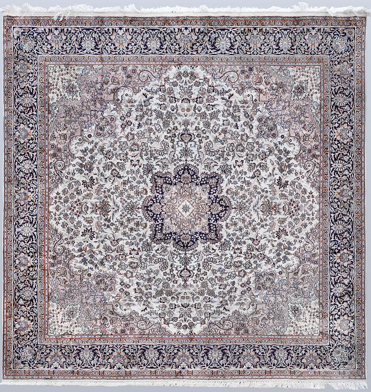 A Kashmir silk rug, approx. 215 x 212 cm.