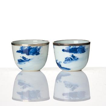 A pair of blue and white 'Nei Fu' cups and a small tray, Qing dynasty for the Thai market.