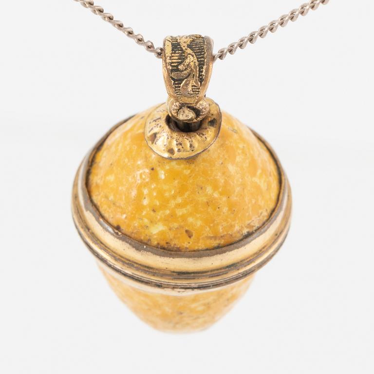 Charm in the form of a lemon with yellow enamel.