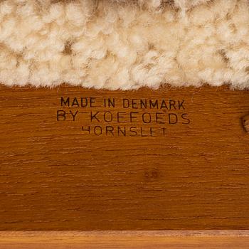A set of six teak dining chairs upholstered in new sheepskin by Niels Koefoed, Denmark, 1960's.