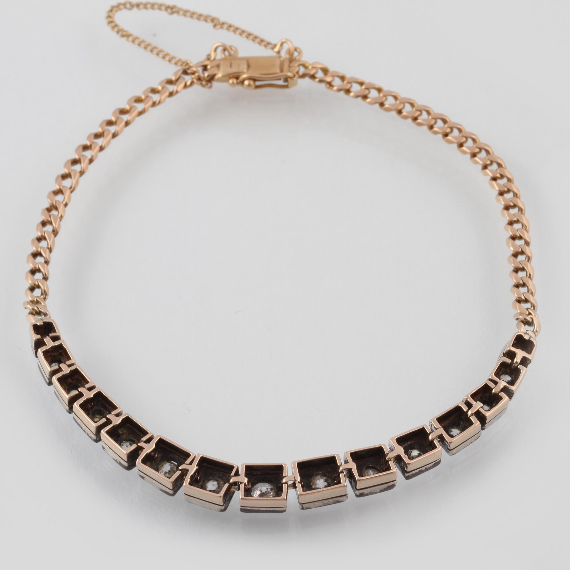 ARMBAND, 18K guld och silver med 15 gammalslipade diamanter, importstämplat. Vikt 7,2 gram.
