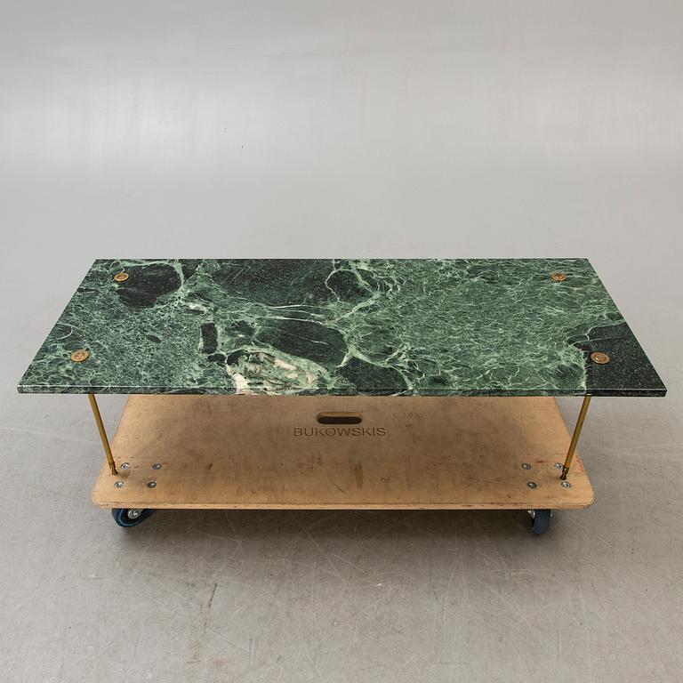 A late 20th century marble coffee table.