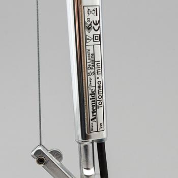 a "Tolomeo mini" table light by Artemide Italy.