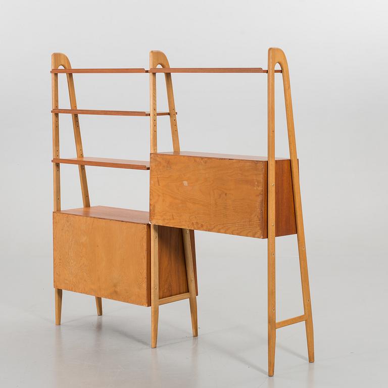 TWO TEAK AND OAK BOOKSHELVES, second half of the 20th century.