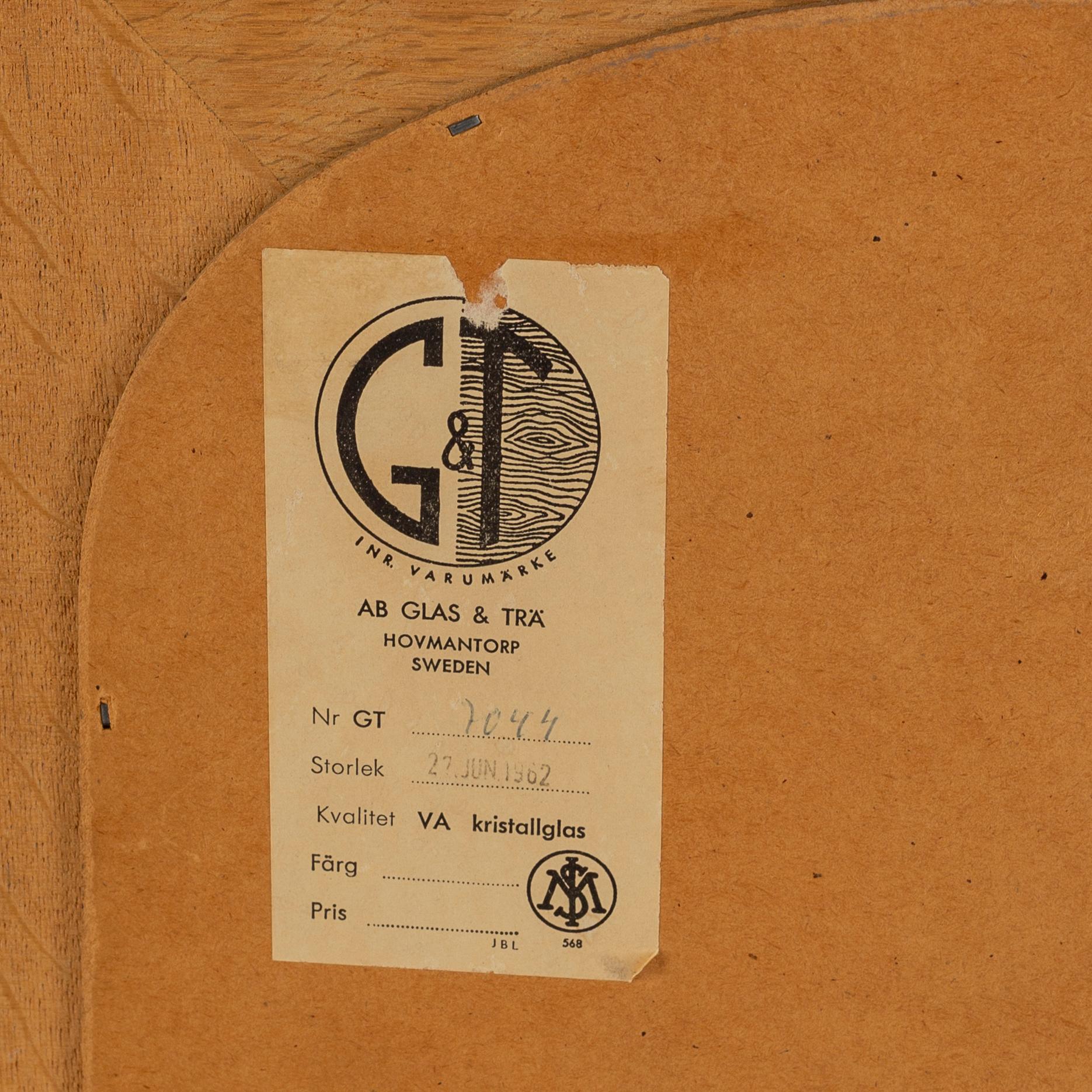 A 1962 oak mirror, AB Glas & Trä, Hovmantorp.