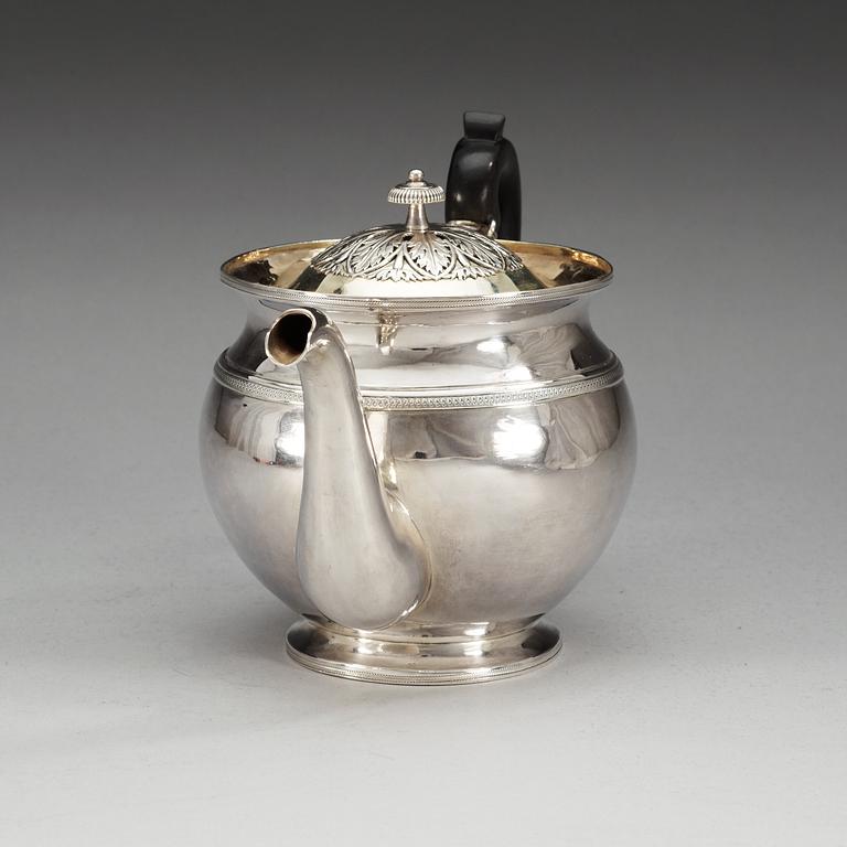 A Russian 20th century parcel-gilt tea-pot, un identified makers mark, S.t Petersburg.