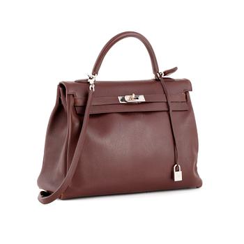 454. HERMÈS, a brown leather handbag, "Kelly 35".