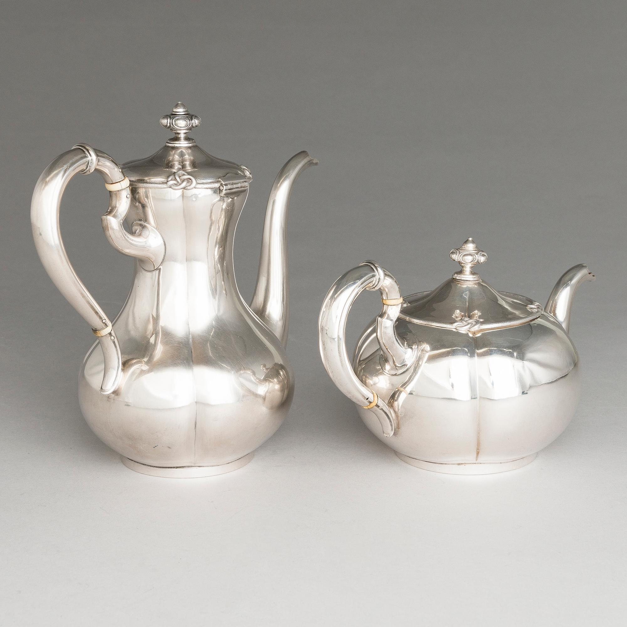SAZIKOV, A 5-piece silver coffee and tea set, mark of the Sazikov Firm, Imperial Warrant, Saint Petersburg 1860.