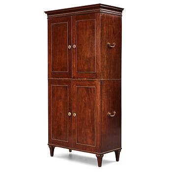 3. A late Gustavian mahogny cupboard.