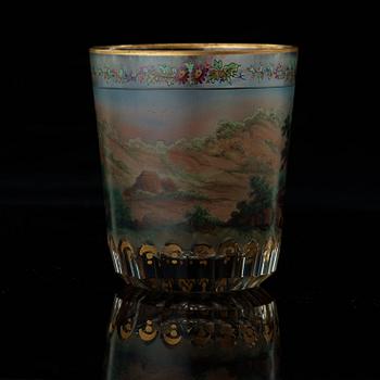 A Bohemian beaker glass, dated Carlsbad 1824.