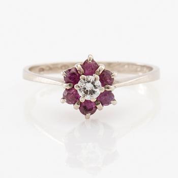 Ring 14K white gold set with a round brilliant-cut diamond and faceted rubies, Finland 1975.
