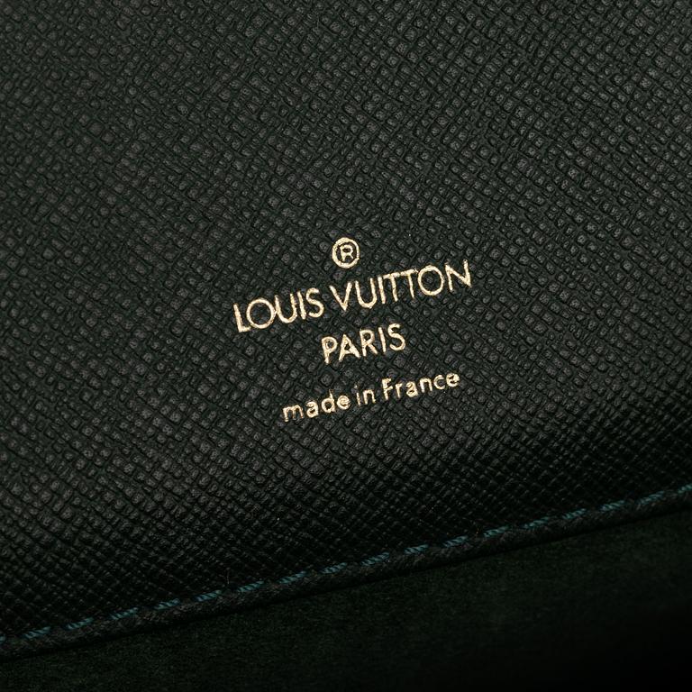 Louis Vuitton, a green Taiga 'Kourad' briefcase, 1997.
