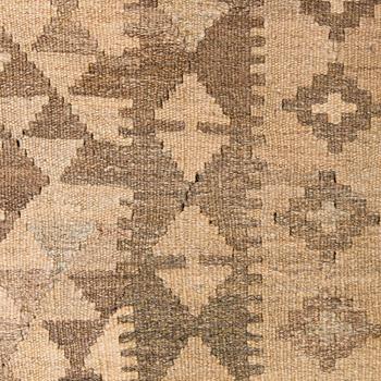 A Kilim carpet, ca. 305 x 196 cm.