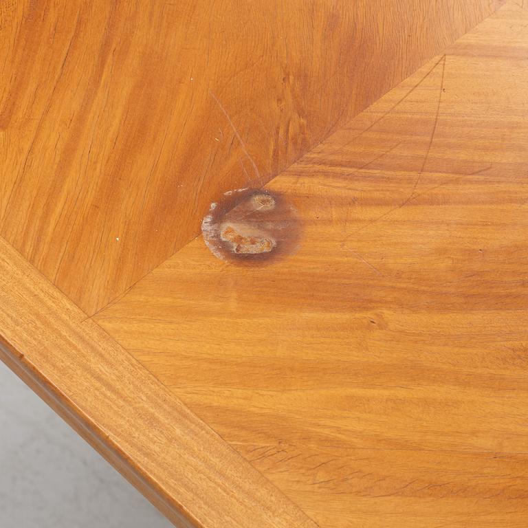 A mahogany veneered writing desk, 20th Century.
