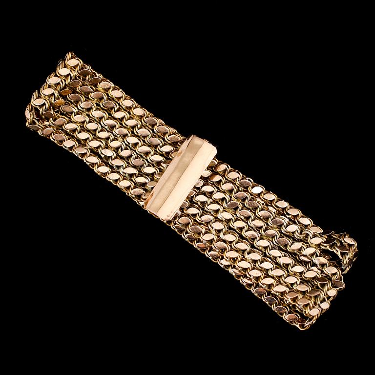 ARMBAND, 18 och 14 k guld. Vikt ca 32 g.