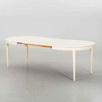 A dining group of 7 pieces by Carl Malmsten for Bodafors from the second half of the 20th century.