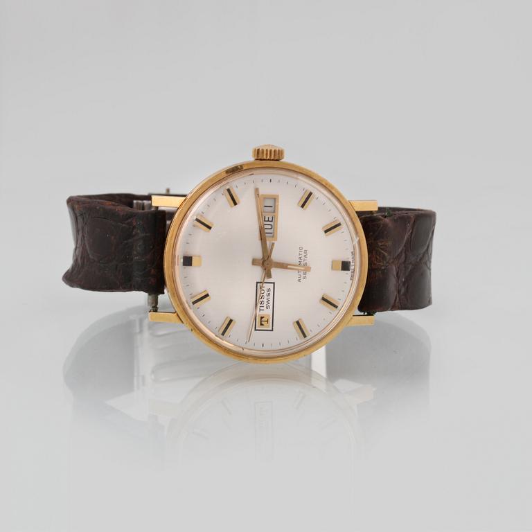 ARMBANDSUR, 18 k guld, Tissot, "seastar".