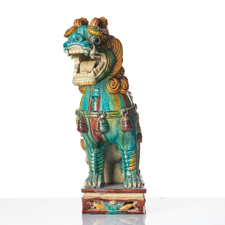 A large sculpture of a buddhist lion, Qing dynasty.