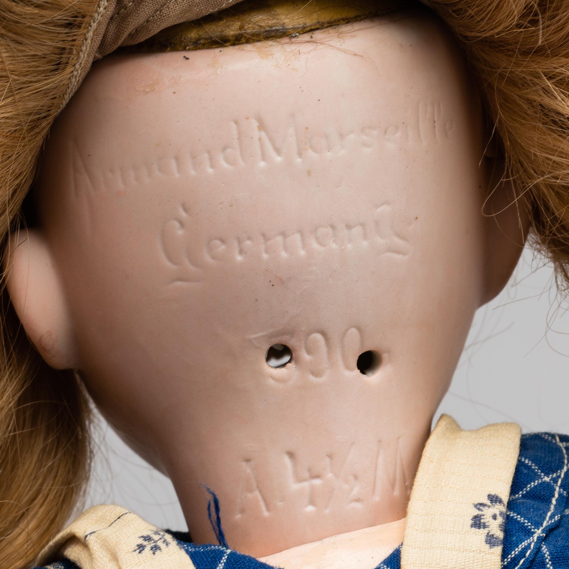 A DOLL FROM Armand Marseille MODELL NR 390. EARLY 20TH CENTURY.