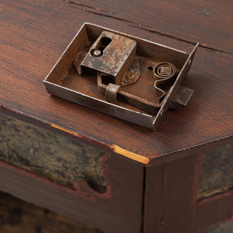 A corner cabinet, 18th Century.