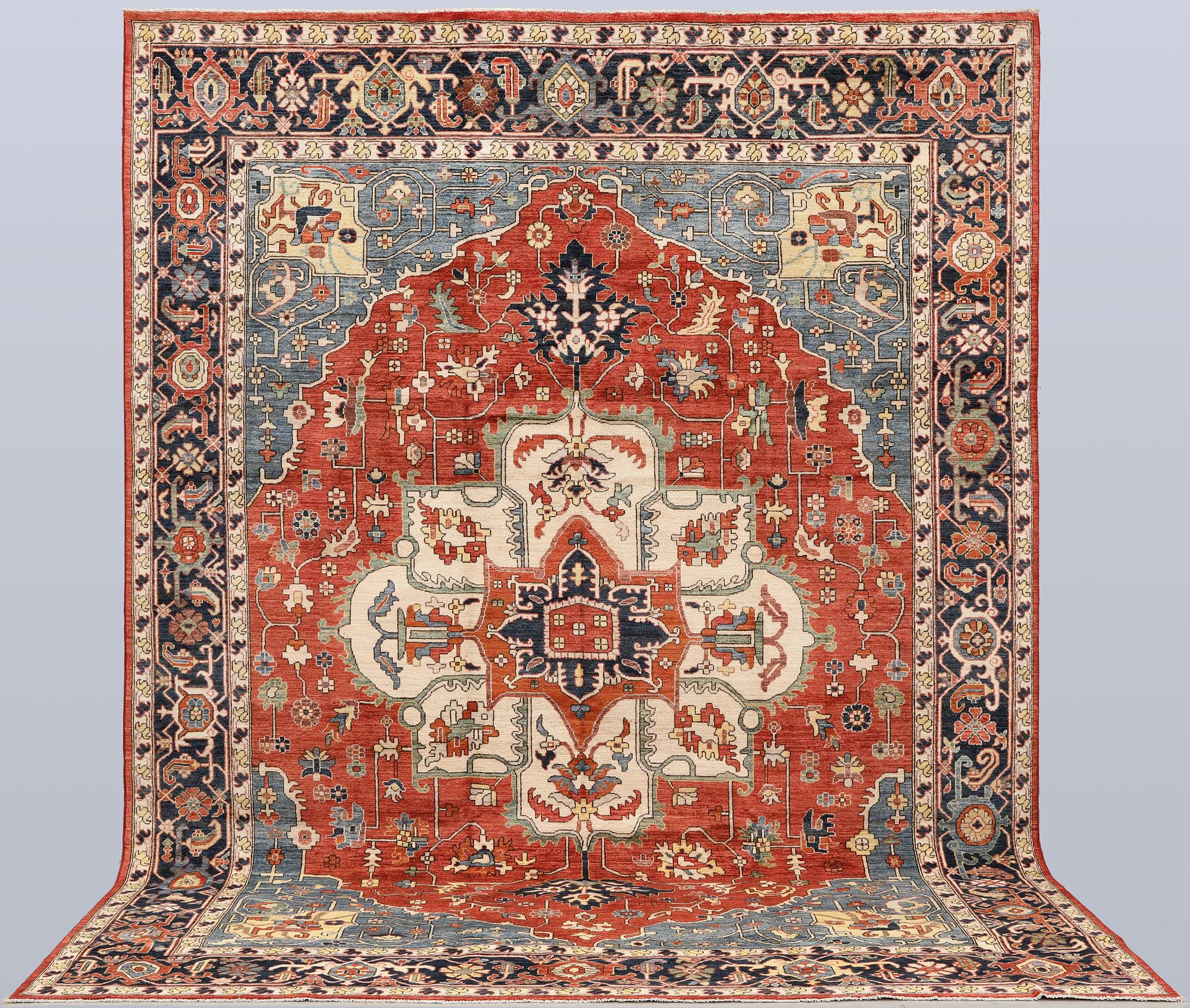 An Oriental carpet, approx. 372 x 274 cm.