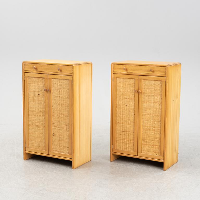 Yngve Ekström, two 'Furubo' pine and rattan cupboards, Swedese, mid 20th century.