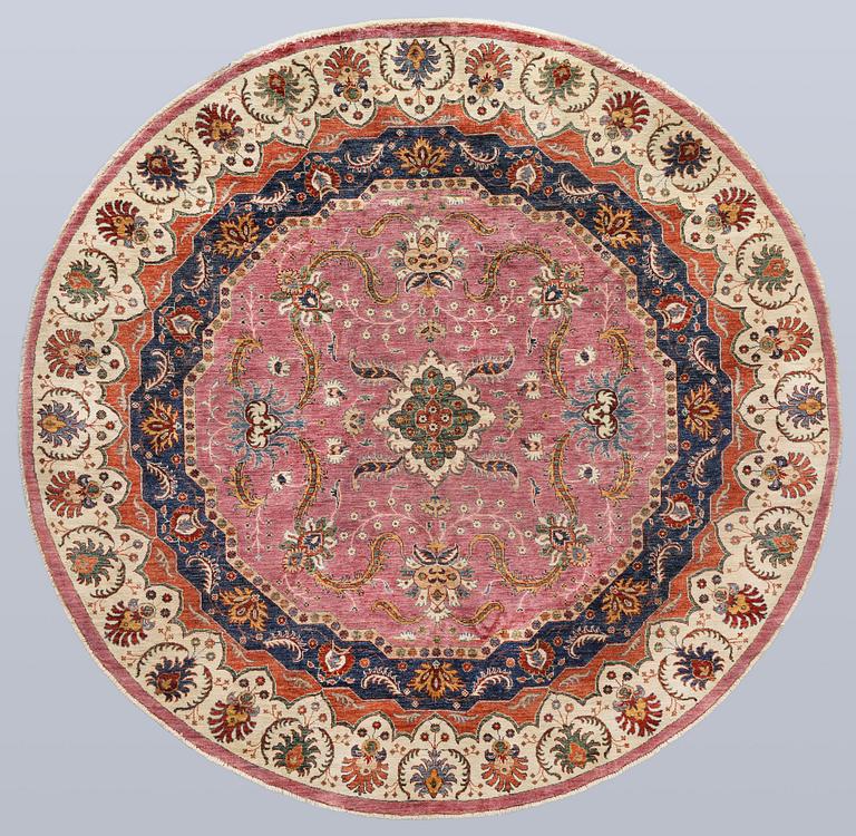 A rug, Ziegler design, diameter approx. 244 cm.