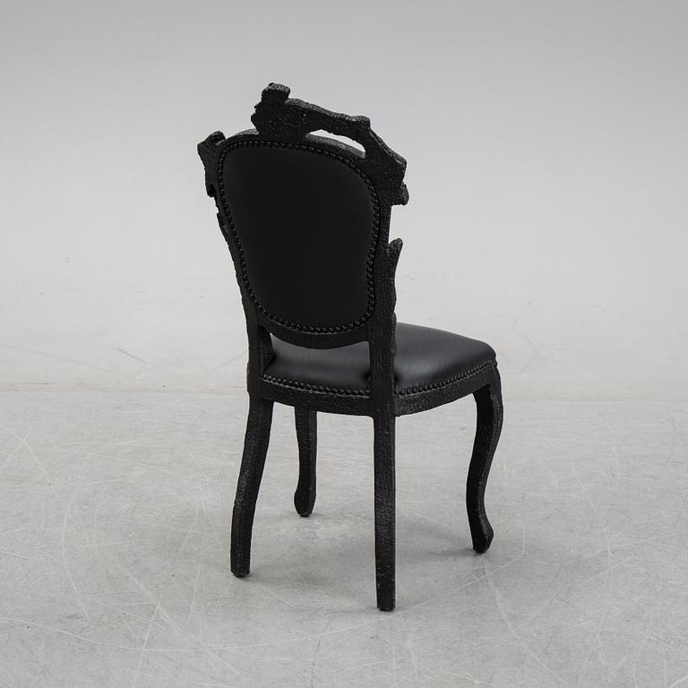 Maarten Baas, a promotional "Smoke dining chair" for Moooi,  after 2002.