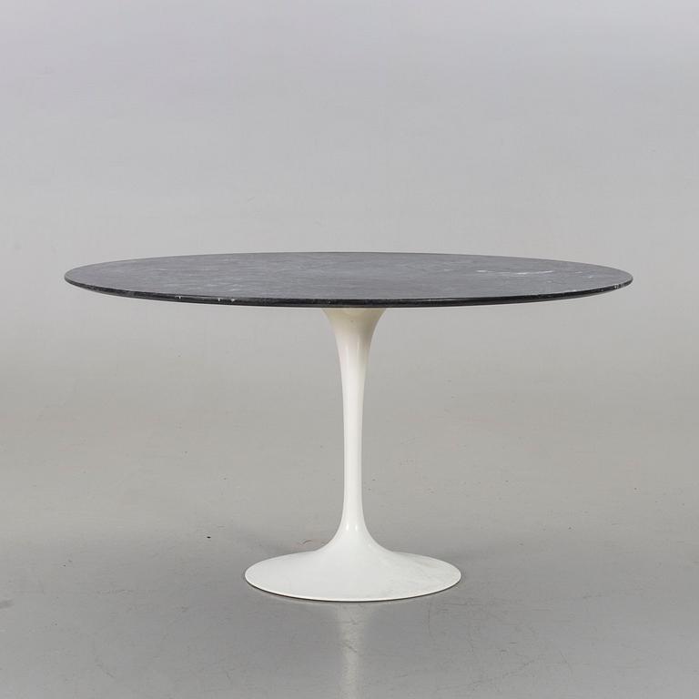AN EERO SAARINEN "TULIP" TABLE BY KNOLL INTERNATIONAL.