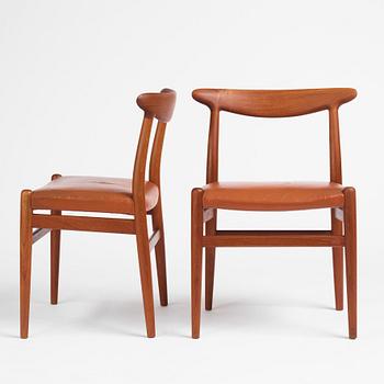 Hans J. Wegner, a set of eight teak chairs model "W2", C.M. Madsens Fabriker, Denmark 1950s.