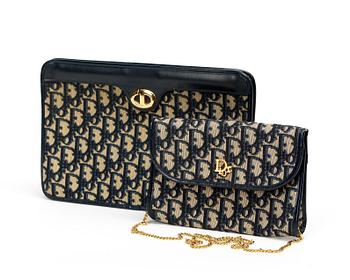 530. A monogram canvas evening bag and clutch by Christian Dior.
