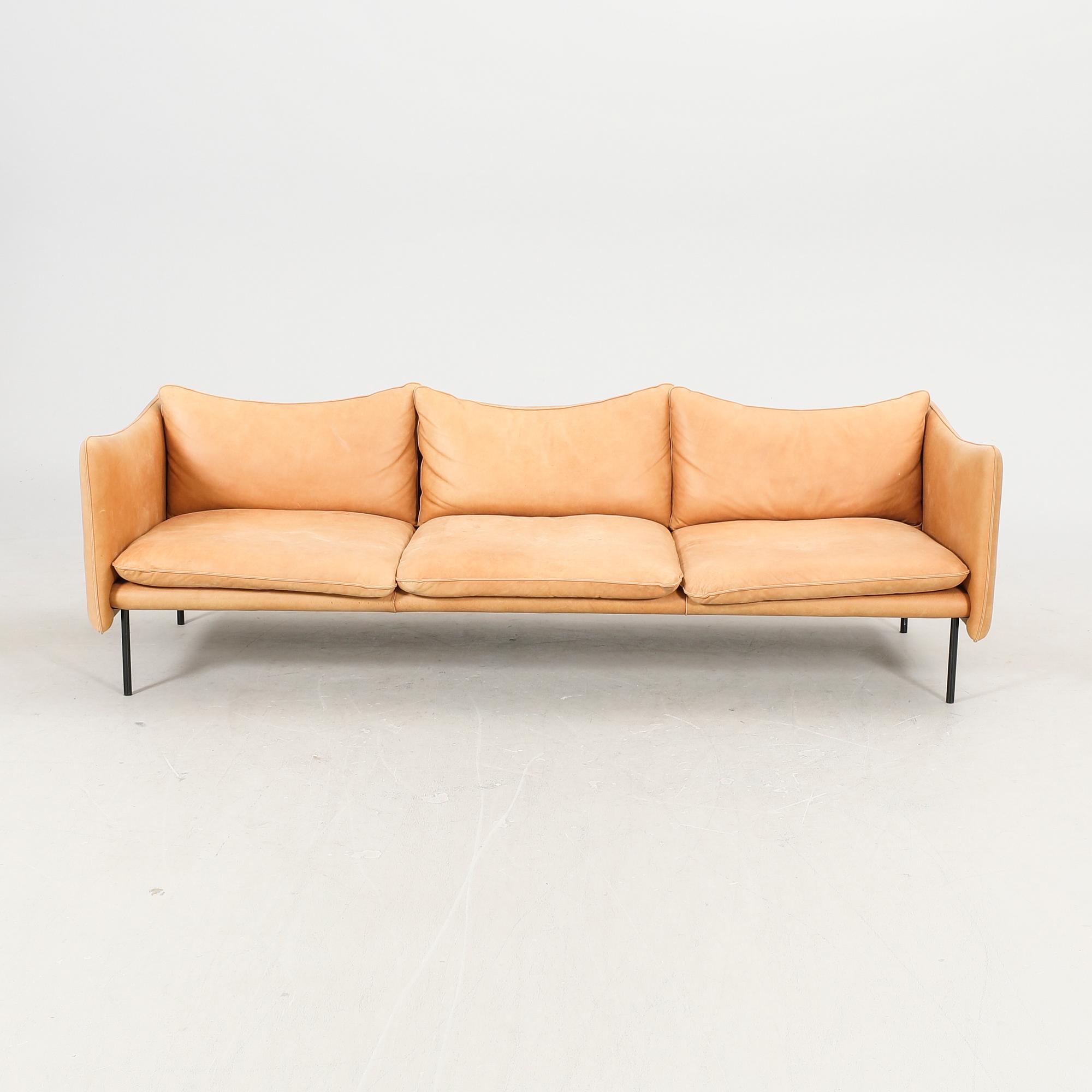 Andreas Engesvik, a Tiki leather sofa and stool for Fogia 21st century.