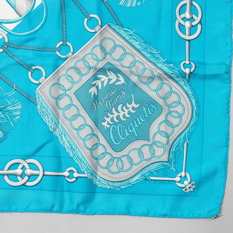 Hermès, a 'Cliquetis' silk scarf.