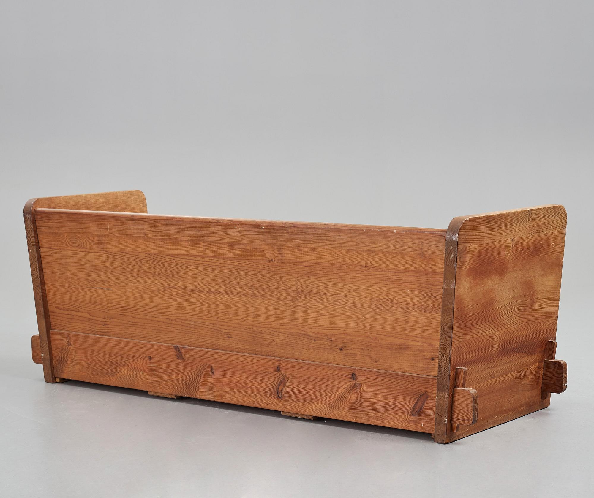 Axel Einar Hjorth, a stained pine "Lovö" sofa, Nordiska Kompaniet, Sweden 1930's.