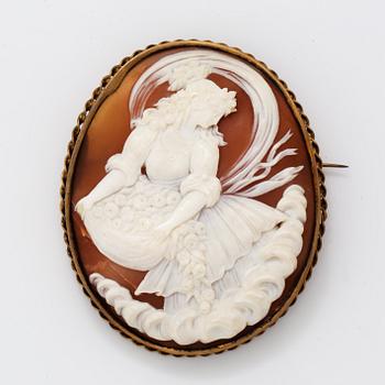 A large shell cameo brooch.