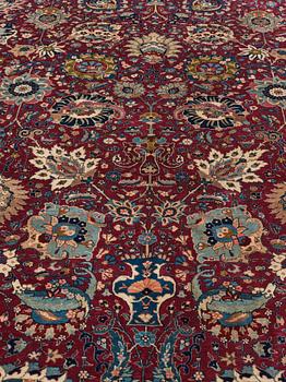 A carpet, semi-antique Tabriz, ca 413,5 x 328,5 cm.