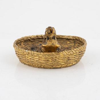 An ashtray, circa 1900.