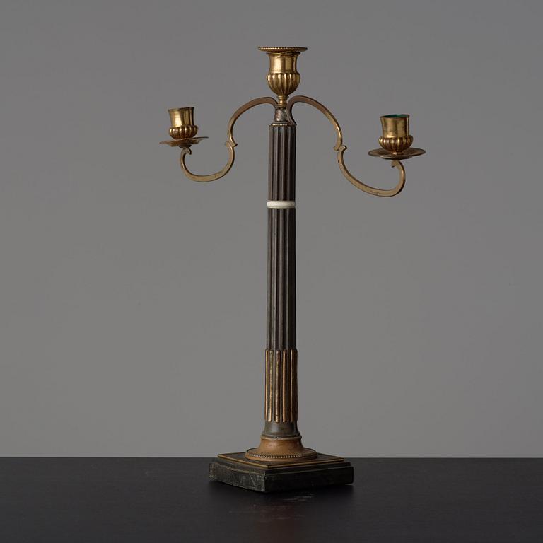 A late Gustavian circa 1800 three-light candelabra.