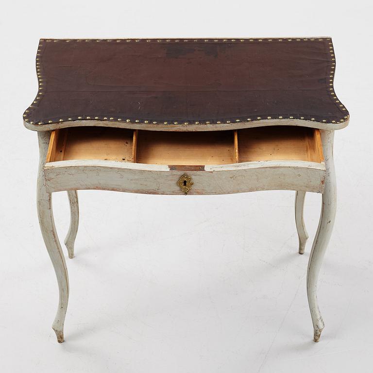 A rococo-style painted table, 19th century.