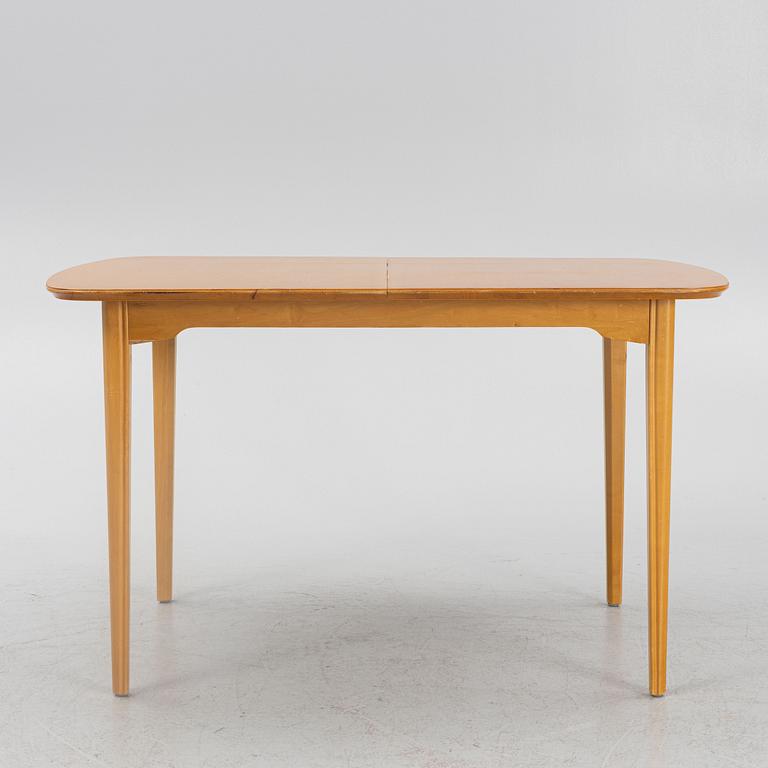 An elm-veneered dining table, Nordiska Kompaniet, Sweden, 1955.