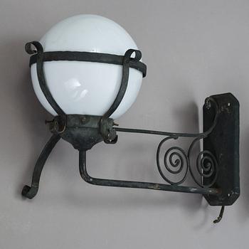 A pair of 1920's copper and glass outdoors wall lights.