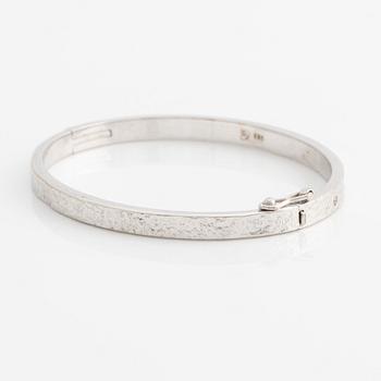 Armring 14K guld med runda briljantslipade diamanter.