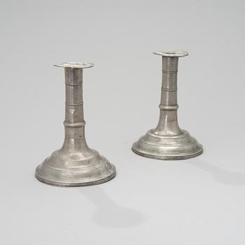 A PAIR OF PEWTER CANDLESTICKS, Johan Gustaf Almqvist, Turku, 1820 and 1823.