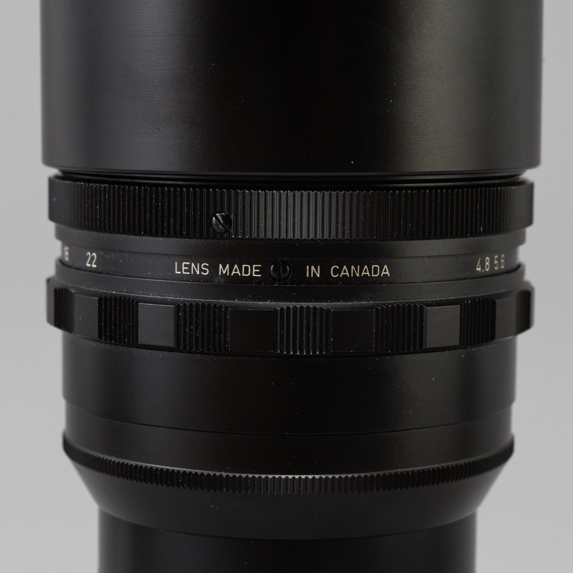 A black Leica Telyt 1:4,8/280 lens no 2298867, Leitz Canada.
